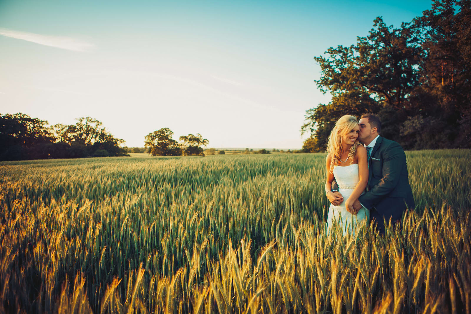 bridebook.co.uk couple in a wheat field