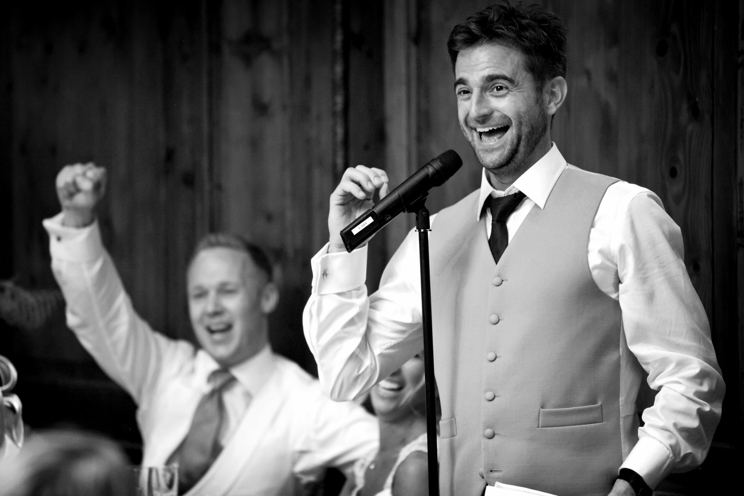 bridebook.co.uk-best man gives speech black and white