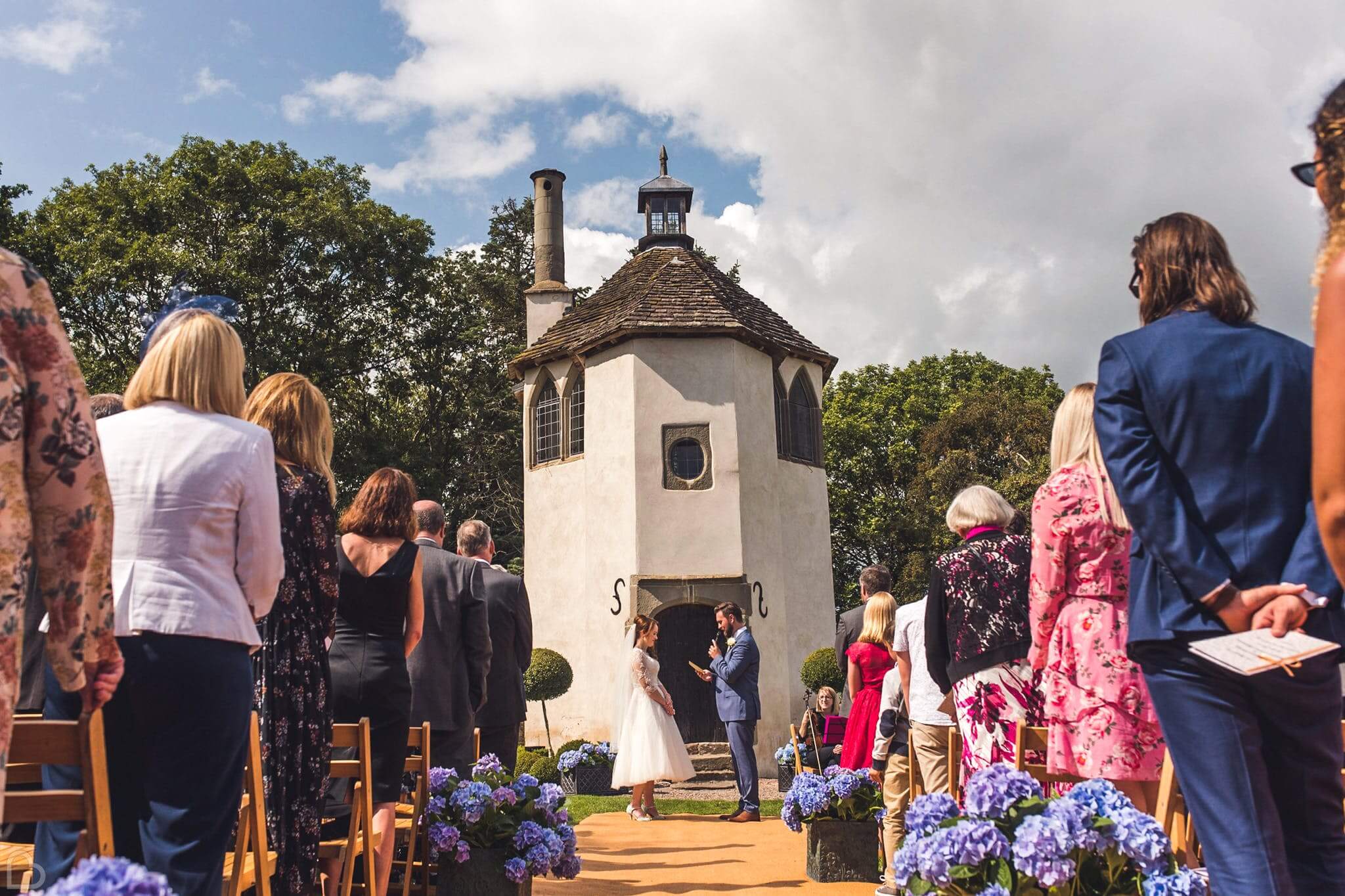 wedding ceremony going on at homme house a historic wedding venue in the uk