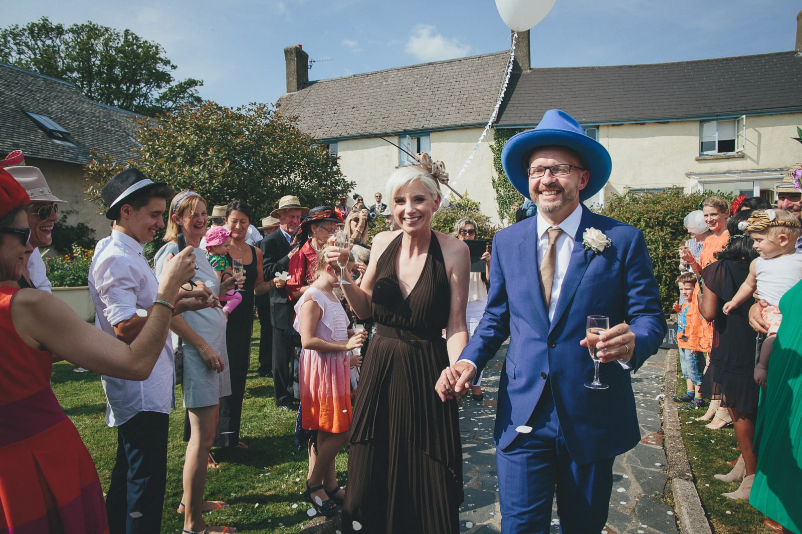 South West | Devon | Hittisleigh | Spring | Boho | DIY | Outdoor | White | Orange | Barn | Real Wedding | Helen Lisk Photography #Bridebook #RealWedding #WeddingIdeas Bridebook.co.uk 