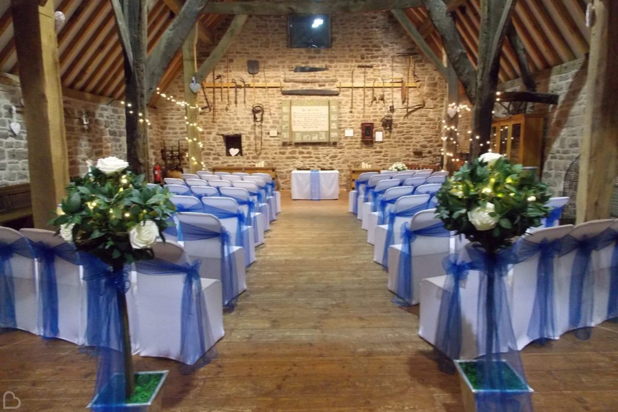 manorial barn set up for a wedding ceremony 