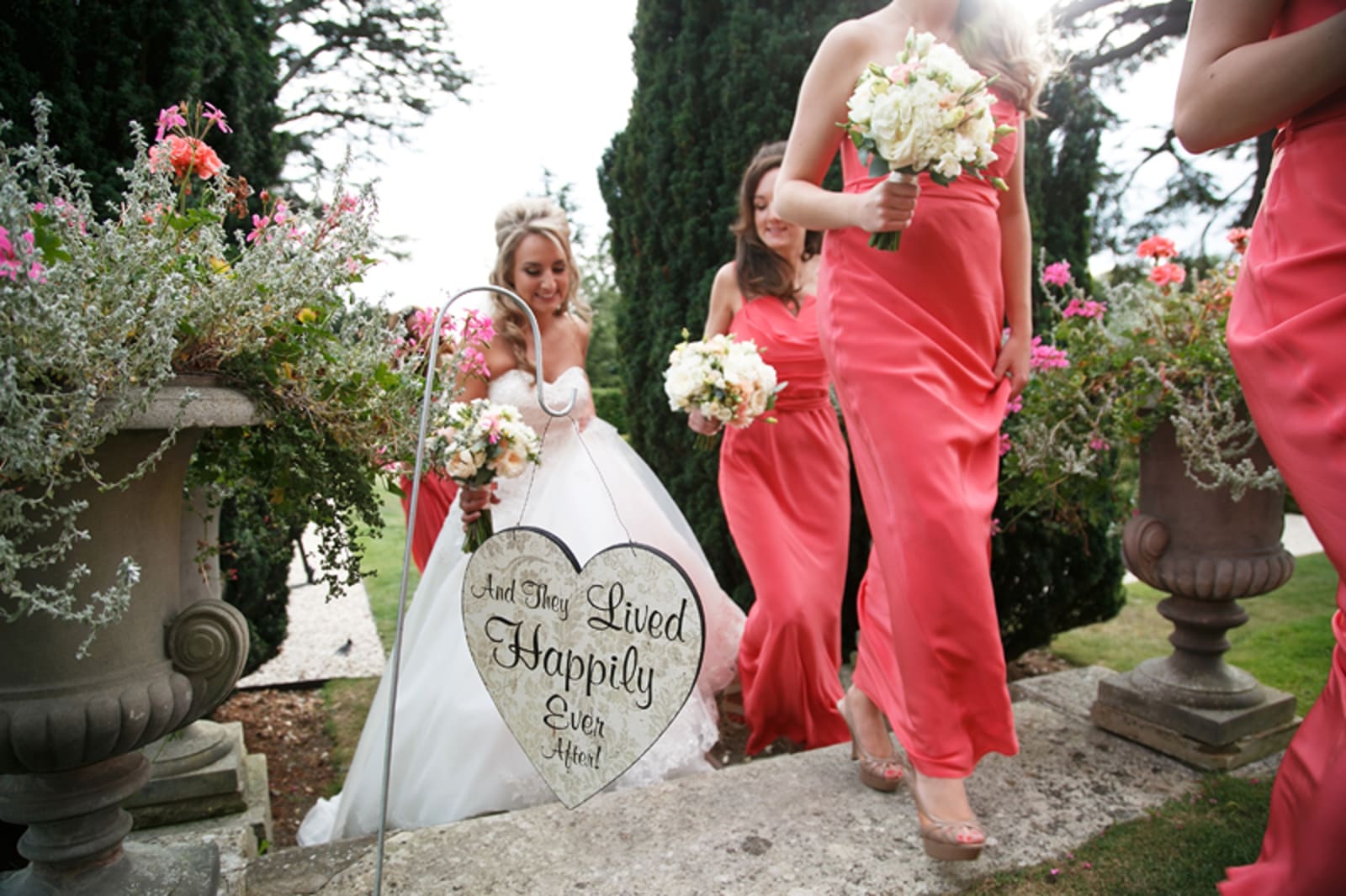 Bridebook.co.uk- bride and bridesmaids climbing stairs