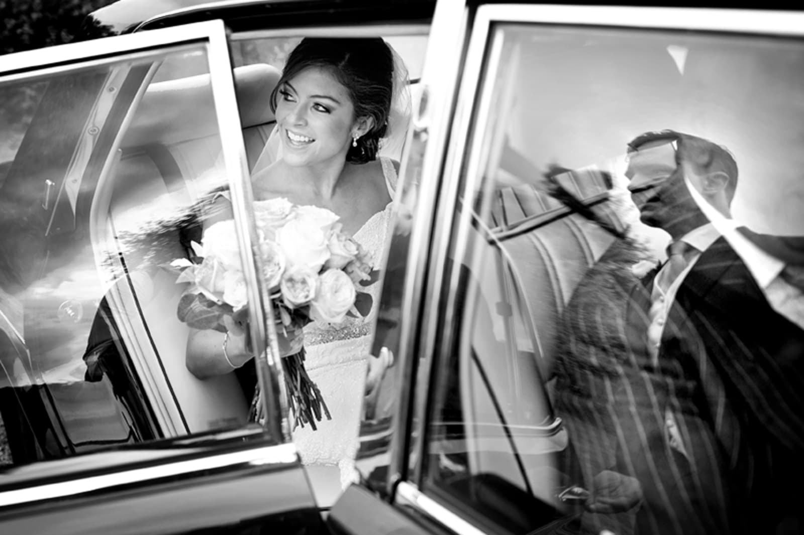 Bridebook.co.uk- bride arriving at ceremony in the car