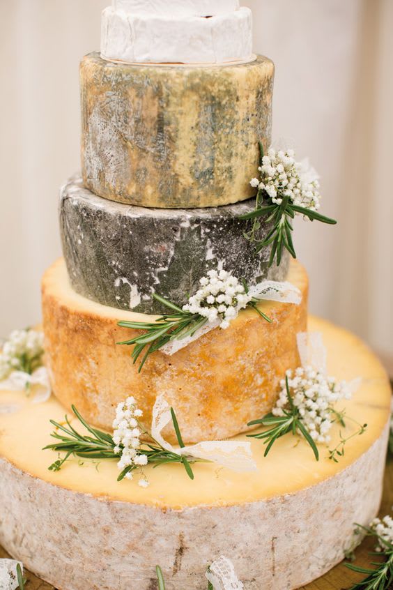 bridebook.co.uk cheese tower with white flowers