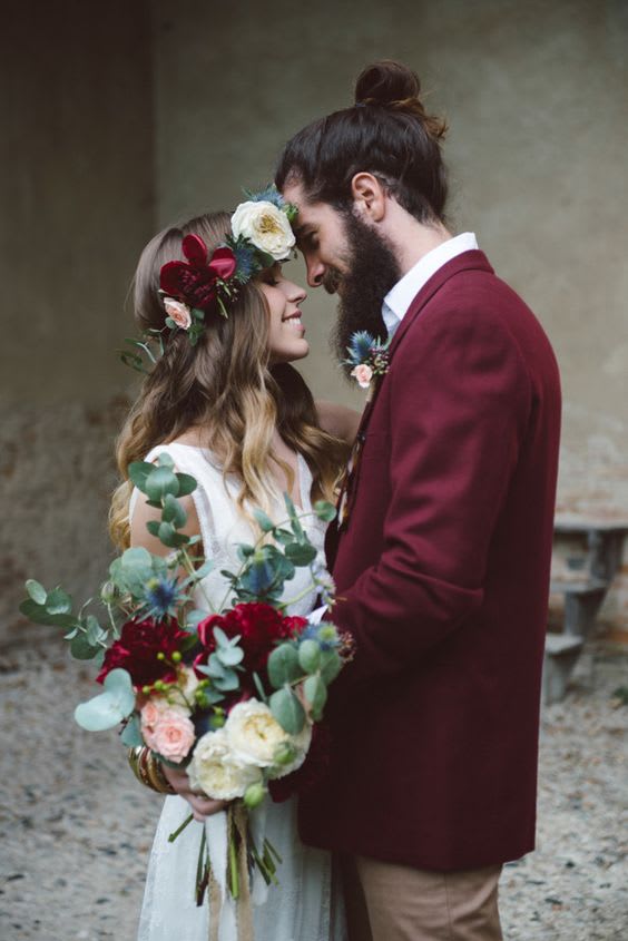 bridebook.co.uk-flower crown bride and groom embrace