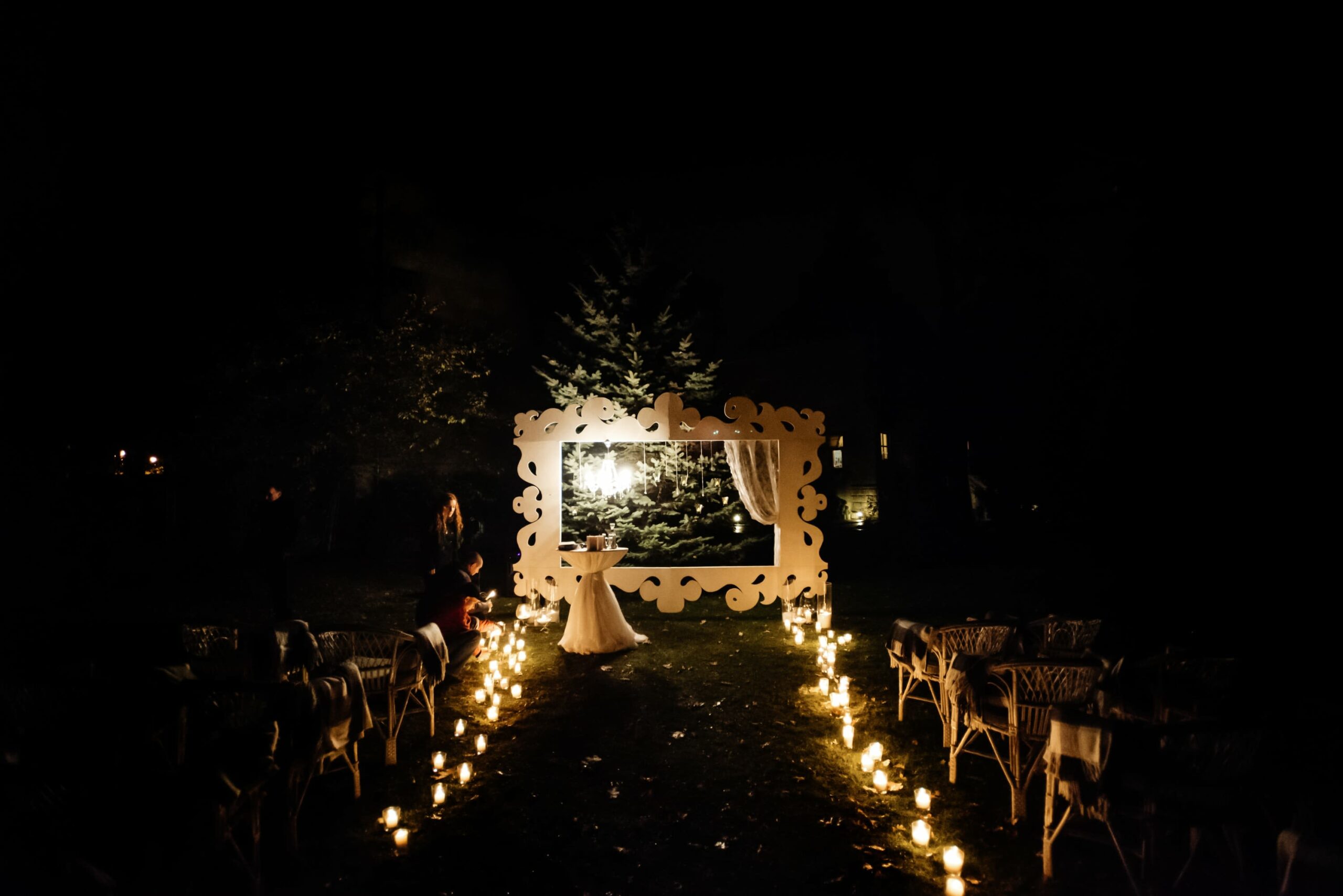 Bridebook.co.uk candlelit aisle nighttime ceremony